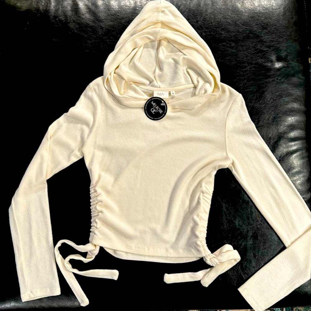 Long sleeve, hooded, cropped light-weight sweater, cinching on sides